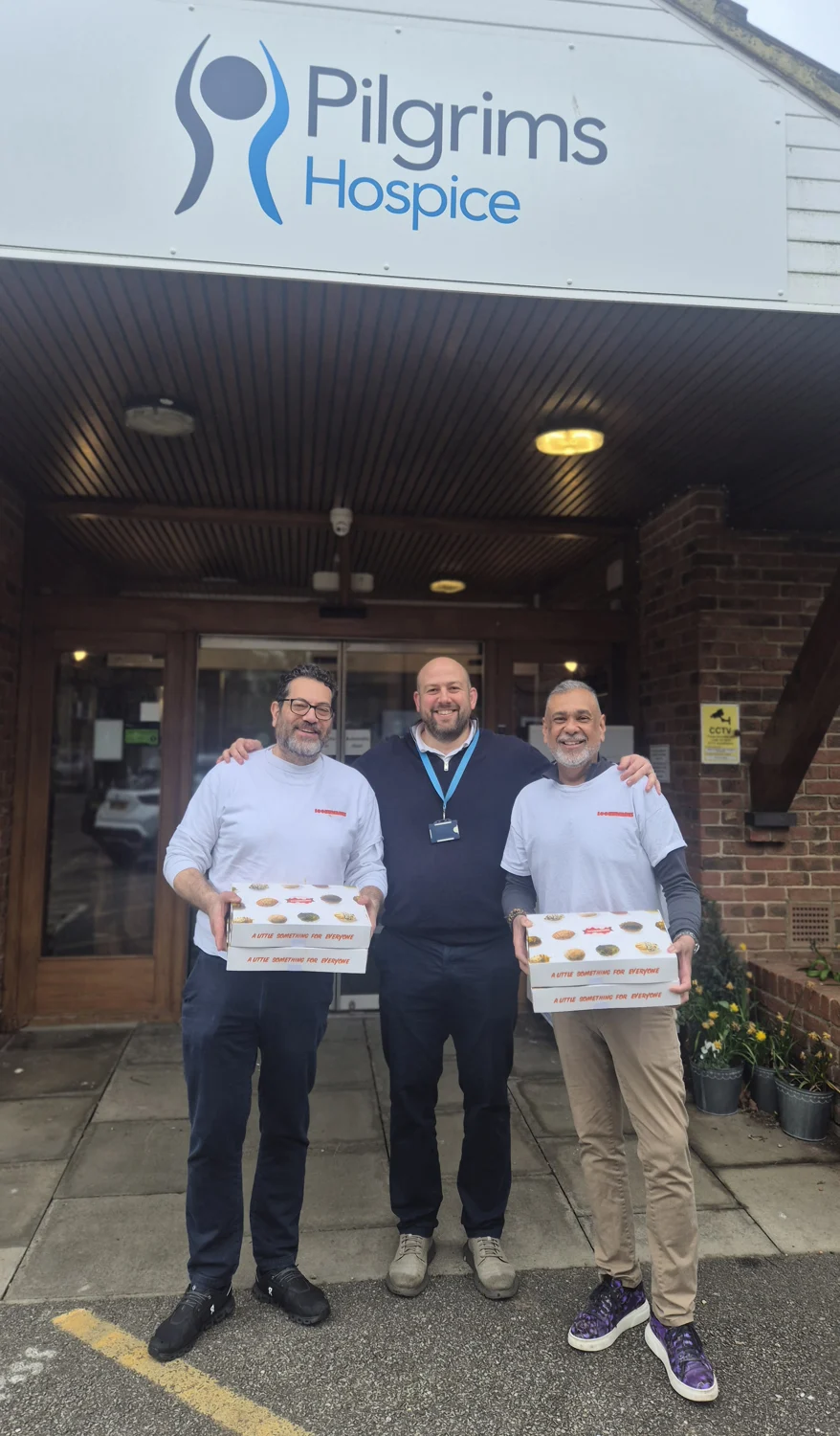 Adam and Cliff delivering Lookumades boxes at Pilgrims Hospice