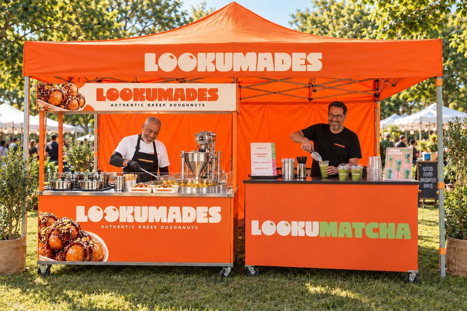 Event setup visual showing Cliff at the Lookumades doughnut cart and Adam at the Lookumatcha bar beneath an orange branded tent