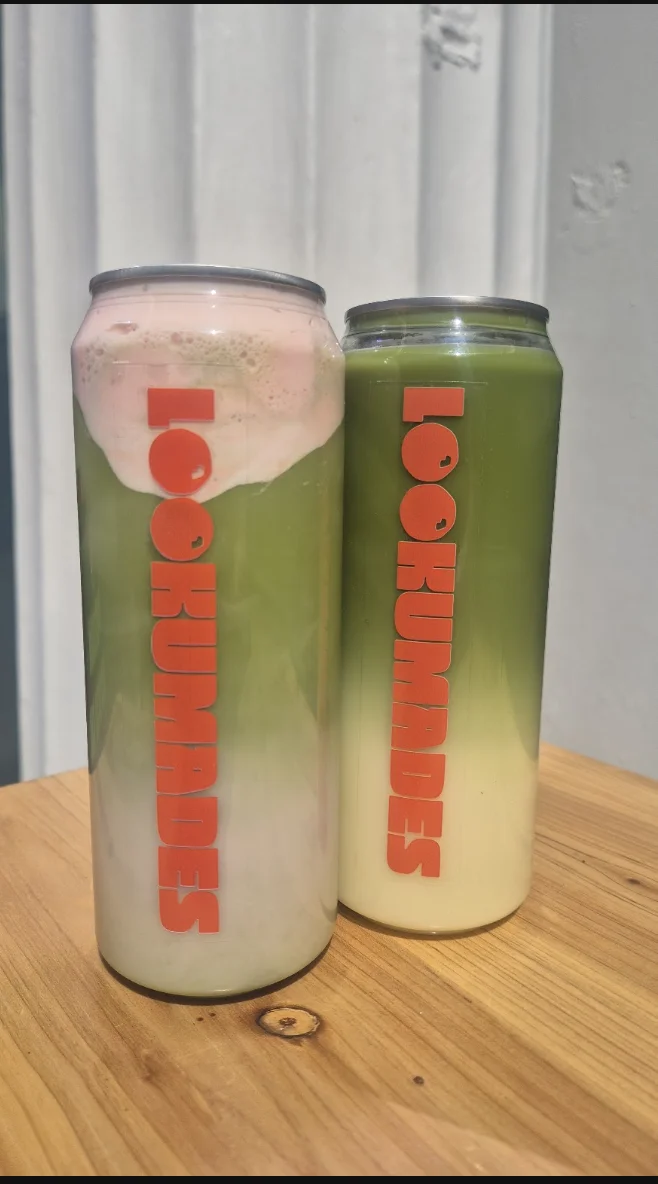Two Lookumades matcha drinks with green tea and creamy layers